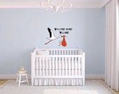 Stork and new born baby